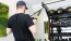 Man working out on piece of equipment in fitness studio