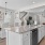 well lit kitchen and living room